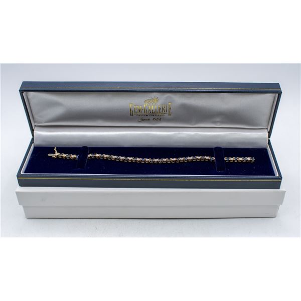 14K YELLOW GOLD TENNIS BRACELET WITH 24 ROUND