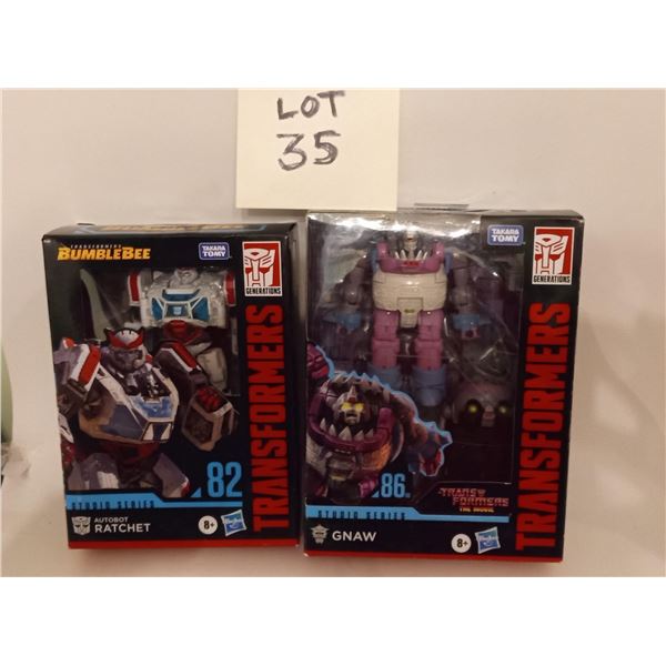 Transformers Studio Series 82 Autobot Ratchet (left) and Transformers Studio Series 86-08 Gnaw