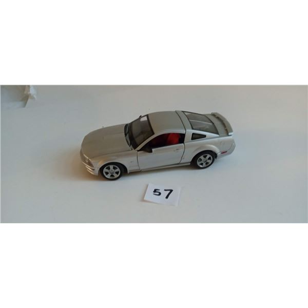 2005 Ford Mustang GT, which was also released as the transforming Transformers Binaltech BT-10