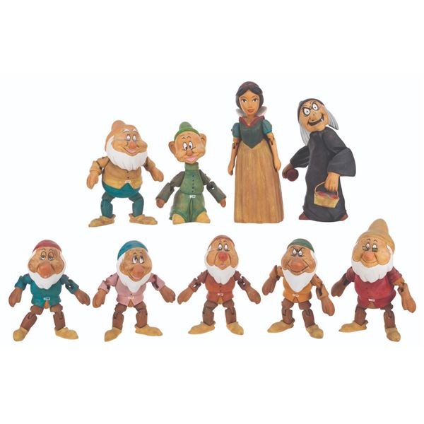 A Set of "Snow White and the Seven Dwarfs" Wooden Dolls.