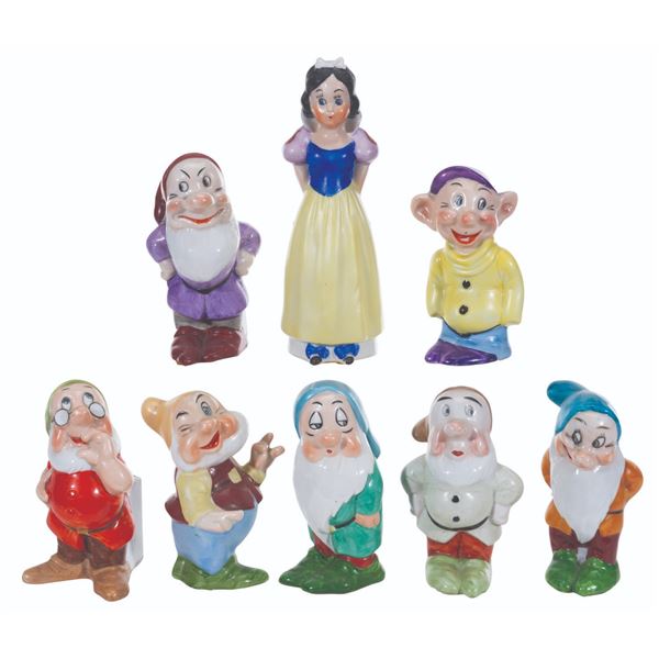 A Set of Maw "Snow White and the Seven Dwarfs" Toothbrush Holders.