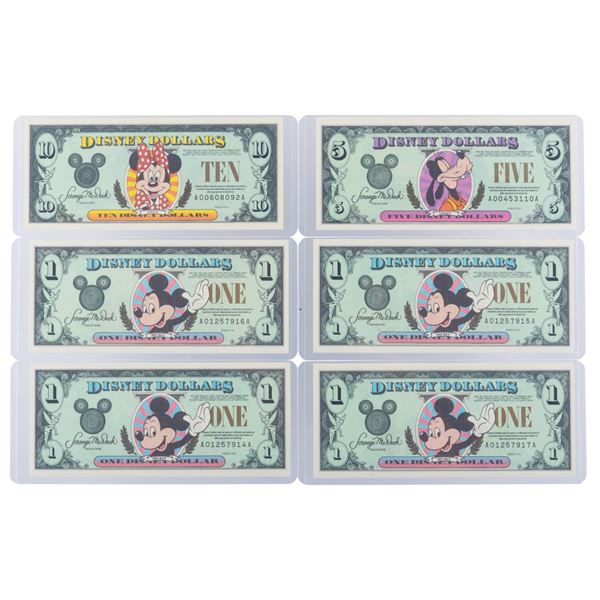 The Disneyland 1996 AA Series $1, $5, and $10 Bills.