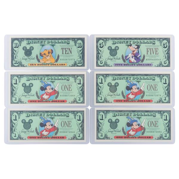 The Disneyland 1997 AA Series $1, $5, and $10 Bills.