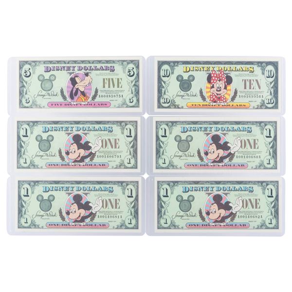 The Disneyland 1999 AA Series $1, $5, and $10 Bills.
