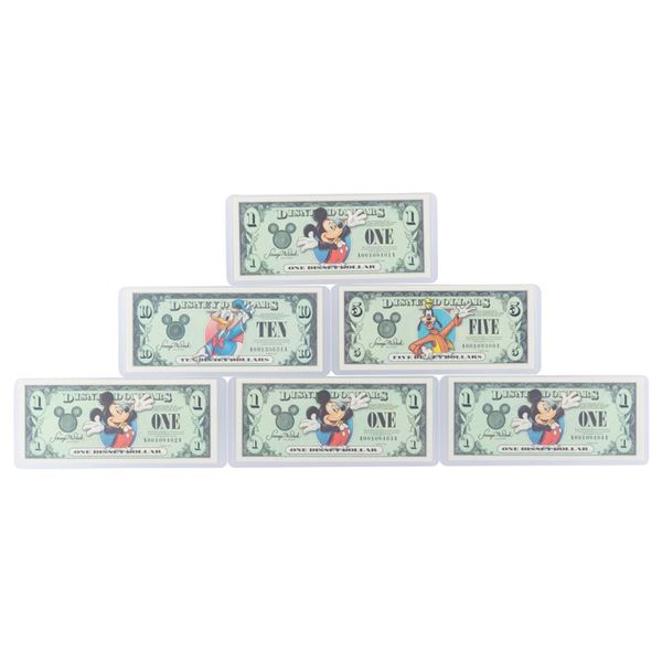 The Disneyland 2003 AA Series $1, $5, and $10 Bills.