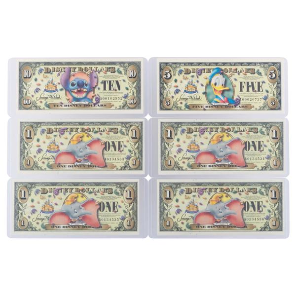 The Disneyland 2005 A First Series $1, $5, and $10 Bills.