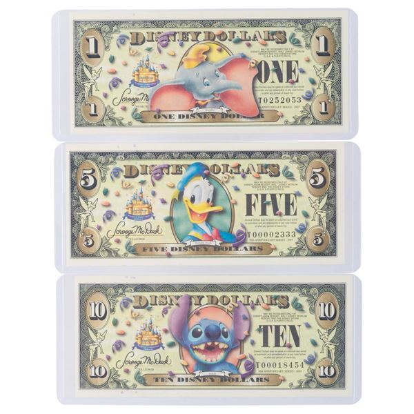 The Disney Store 2005 T First Series $1, $5, and $10 Bills.