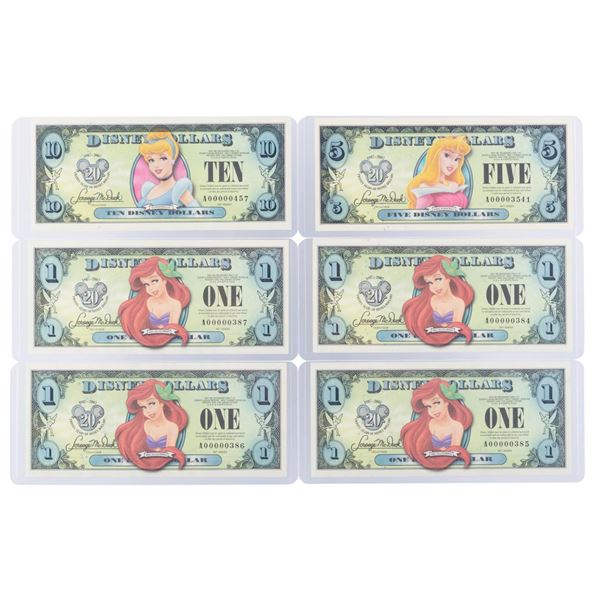 The 2007 Disney Dollars 20th Anniversary Series $1, $5, and $10 Bills.
