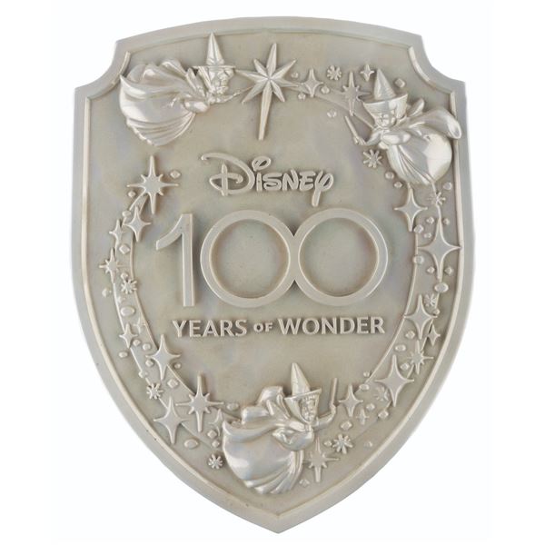 A Disneyland "Disney 100 Years of Wonder" Lamppost Shield.