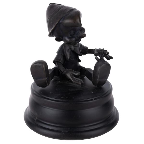 A Disneyland Hub Pinocchio Bronze Collectible.