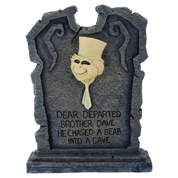 A Haunted Mansion Light-Up Tombstone Figure.