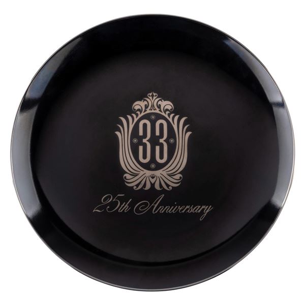 A Disneyland Club 33 25th Anniversary Plate.