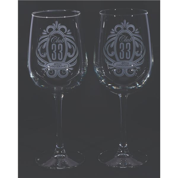 A Pair of Club 33 40th Anniversary Wine Glasses.