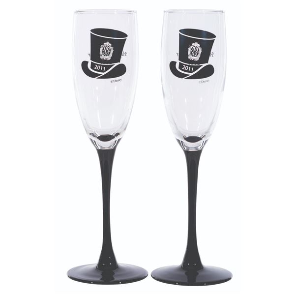 A Pair of Club 33 Black-Stemmed New Year's 2011 Glasses.