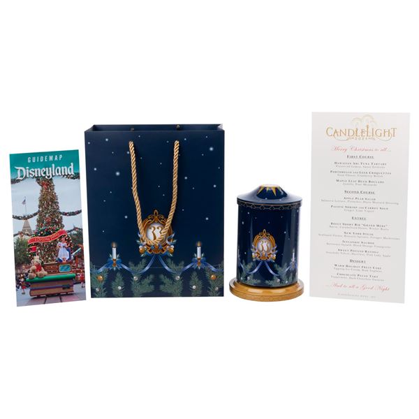 A Club 33 Candlelight Processional Cookie Tin Music Box and Menu.