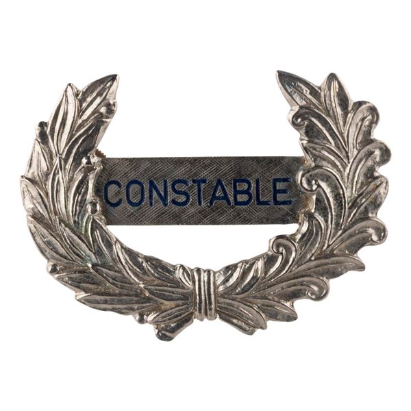 A Walt Disney World Constable Hat Badge.
