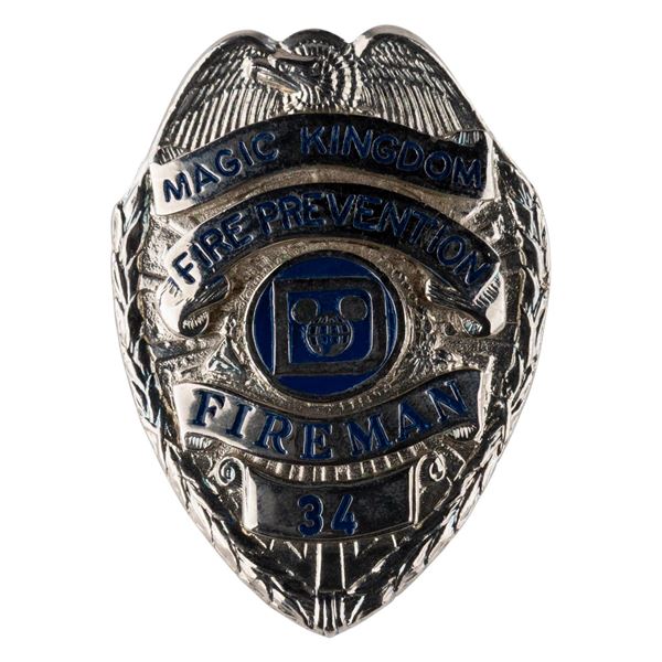 A Magic Kingdom Fireman Badge.