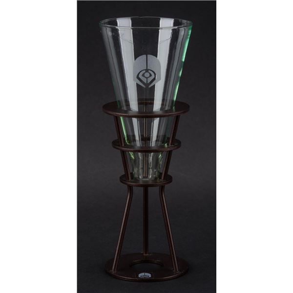 A Quark's Souvenir Shot Glass and Holder.