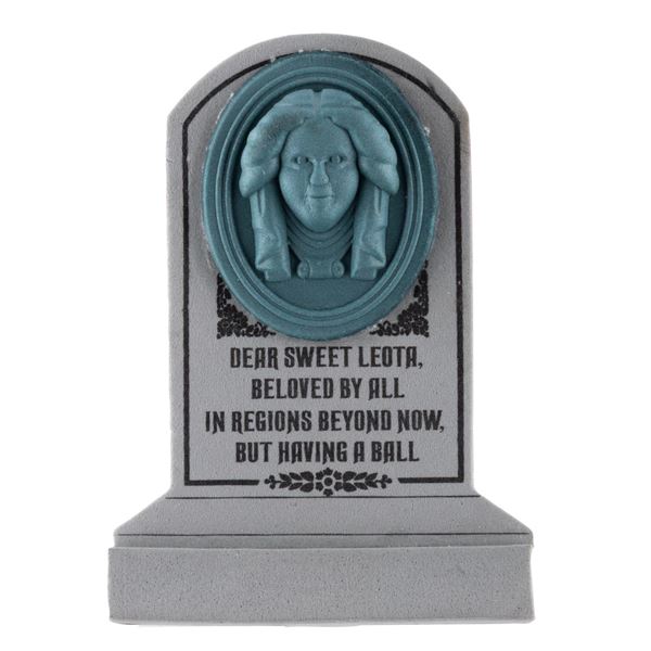 A Haunted Mansion Leota Tombstone Antenna Topper.