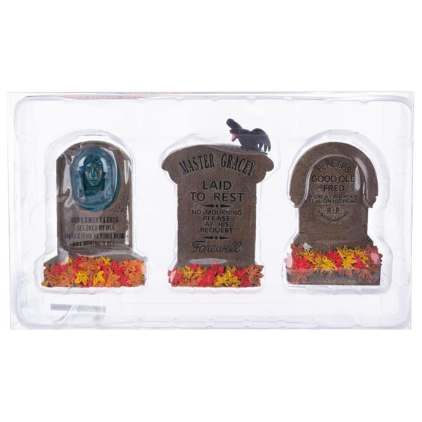 A Haunted Mansion Tombstone Figure Set.