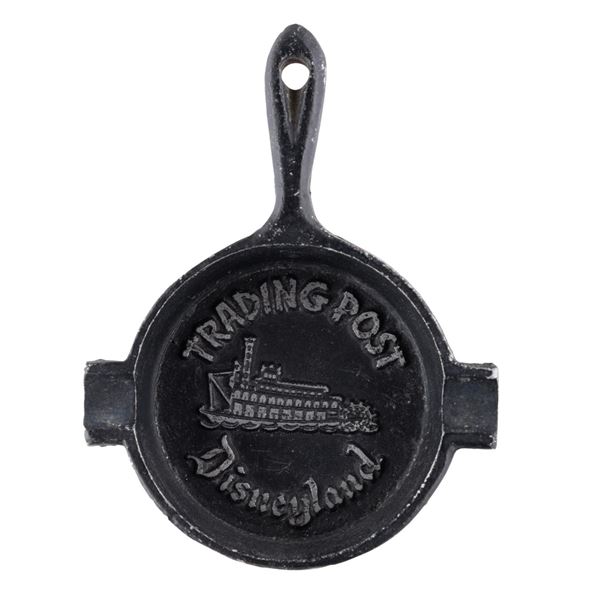A Cast Iron Disneyland Trading Post Ashtray.
