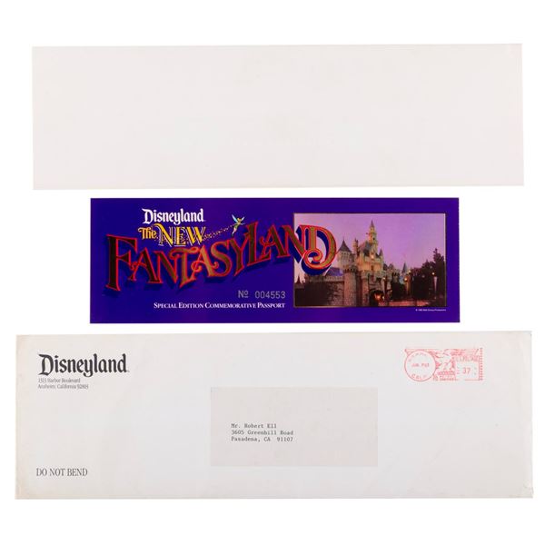 A Disneyland New Fantasyland Commemorative Passport.