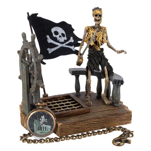 An Adventures on the 7 Seas Lagoon Figurine and Watch.