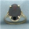 Image 1 : Garnet Solitaire Statement Ring in 14k Yellow Gold
