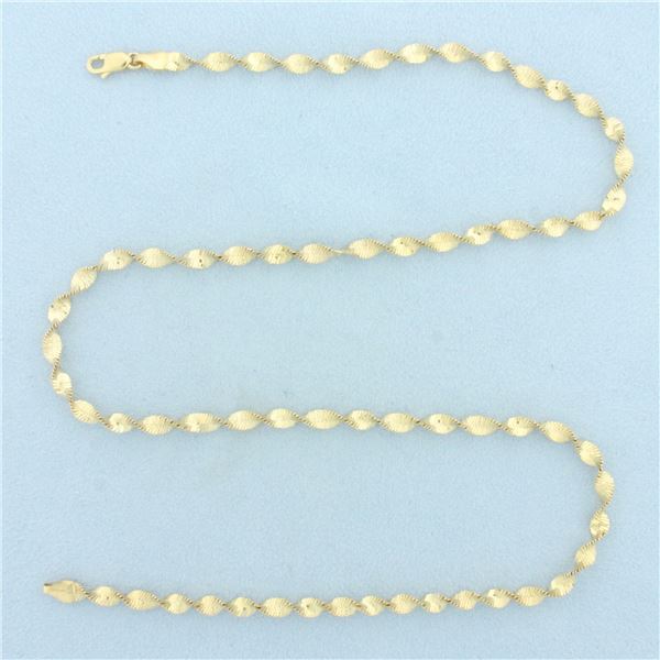 Italian 20 Inch Twisting Herringbone Link Chain Necklace in 14k Yellow Gold