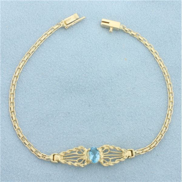 Swiss Blue Topaz Bracelet in 14k Yellow Gold