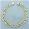 Image 1 : Triple Loop Charm Bracelet in 14k Yellow Gold