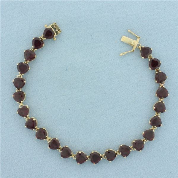 Heart Cut Garnet Tennis Bracelet in 10K Yellow Gold