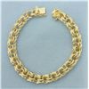 Image 1 : Triple Loop Charm Bracelet in 14k Yellow Gold