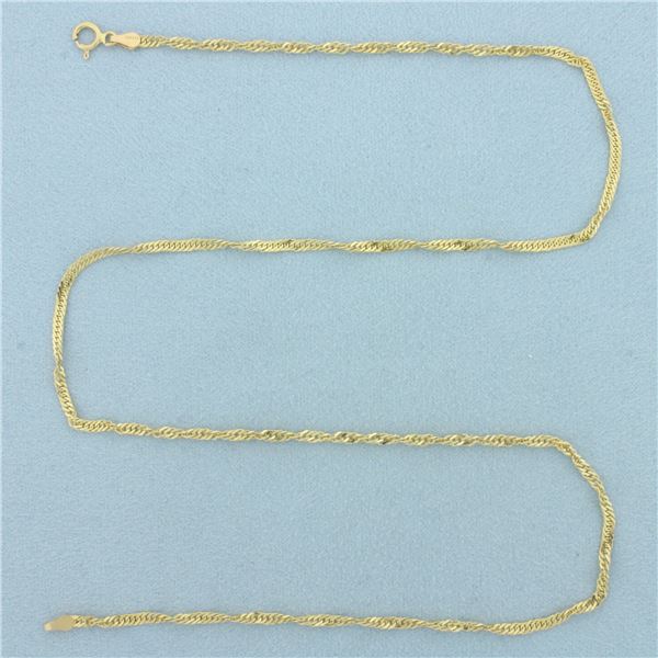 18 Inch Twisting Curb Link Chain Necklace  in 14k Yellow Gold