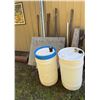 Image 2 : Scrap Lumber, Metal Poles, and Two 55-Gallon Plastic Barrels