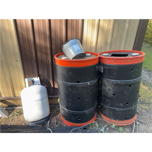 Two Plastic Bear Bait Drums with Red Trim and Propane Cylinder