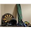 Image 1 : Dartboard, Ladder Golf Case, Motorcycle Helmet, and More!