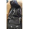 Image 1 : TourTrek Black Duffel Bag with Shoulder Strap and Multiple Zippered Compartments