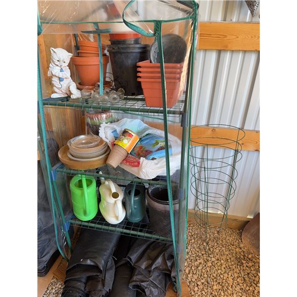 Greenhouse With Planters and Watering Cans