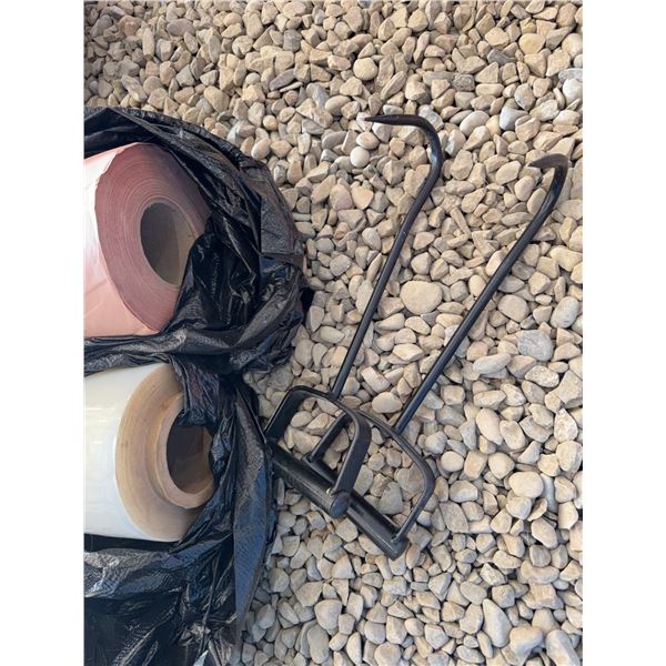 Paper and Plastic Rolls fir packaging meat with pair of hand spikes