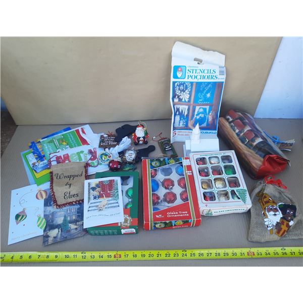 Assortment of vintage and retro Christmas items, including boxed glass tree ornaments, greeting card