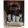 Image 5 : Vintage 1930s wooden "tombstone" style tube radio, similar to models produced by manufacturers like 