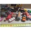 Image 4 : Assorted vintage and loose toys, including die-cast cars, toy trucks, a stationary steam engine, and