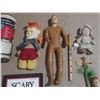 Image 3 : Collection of various vintage toys, books, and small collectibles.