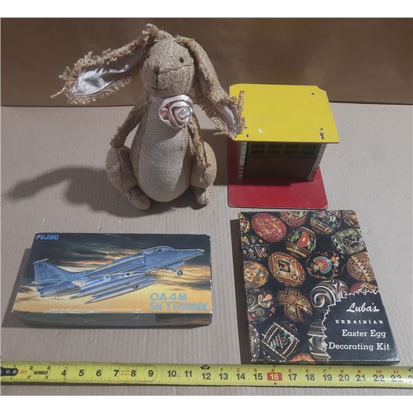 Collection of items including handmade-style plush rabbit doll , a eagle tin toy garage, a Fujimi OA