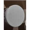 Image 6 : Set of four ceramic or porcelain kitchen storage canisters in graduating sizes with white bodies, pi