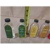 Image 2 : Collection of vintage glass bottles, mostly labeled as W.T. Rawleigh Company extract and flavoring b