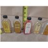 Image 3 : Collection of vintage glass bottles, mostly labeled as W.T. Rawleigh Company extract and flavoring b