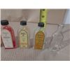 Image 4 : Collection of vintage glass bottles, mostly labeled as W.T. Rawleigh Company extract and flavoring b