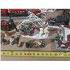 Image 3 : Collection of miniature Christmas village buildings, figurines, a train set, and a "Village Skating 